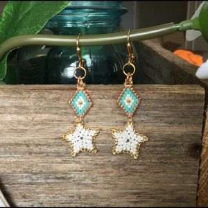 Beaded white stars, gold trim